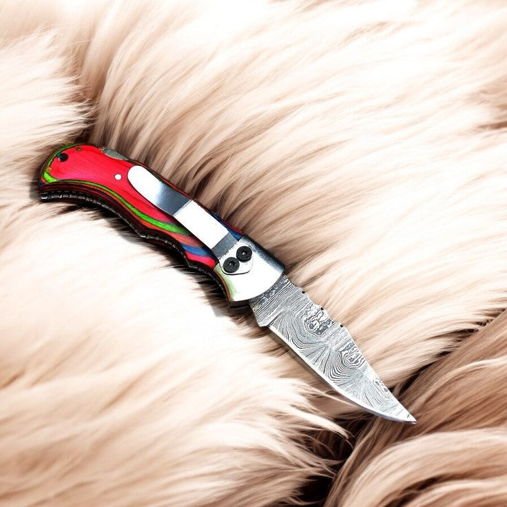 Side View of Multicolor Pakka Wood Handle and Steel Bolster on 3-Inch Clip Knife