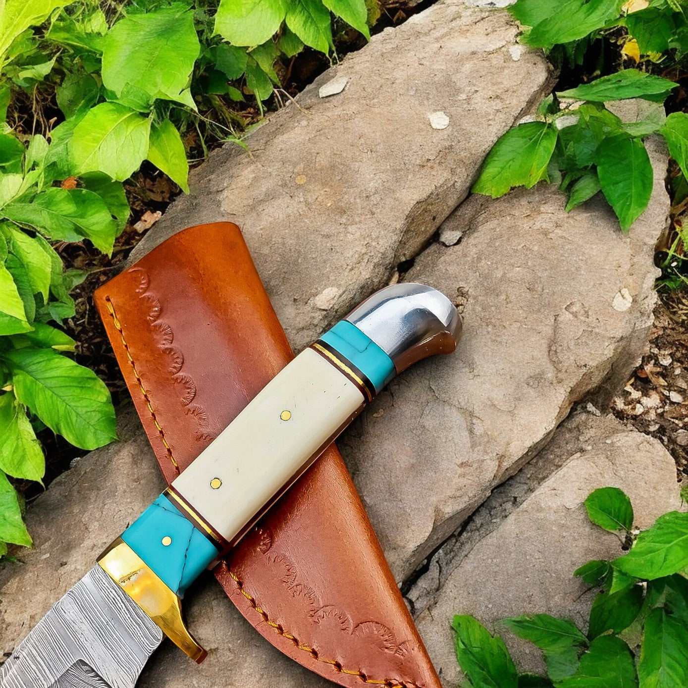 Damascus Hunting Knife Displayed with Accessories