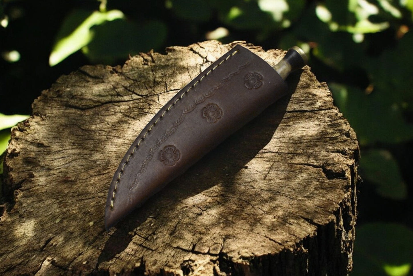 "Leather sheath included with the custom hunting skinning knife."