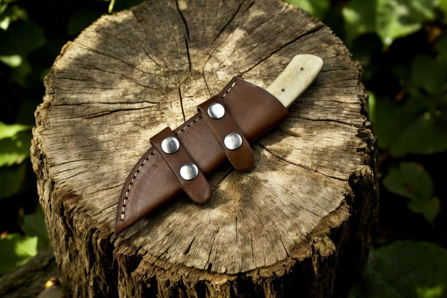 Leather sheath for hand forged skinning knife with Damascus steel blade
