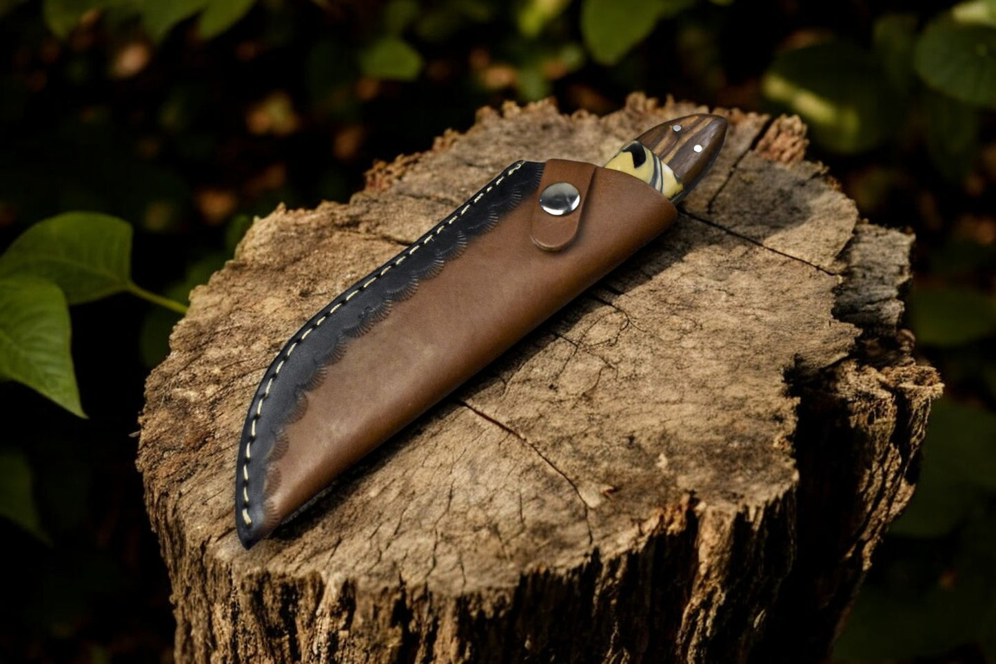 Damascus steel hunting knife with a leather sheath included.