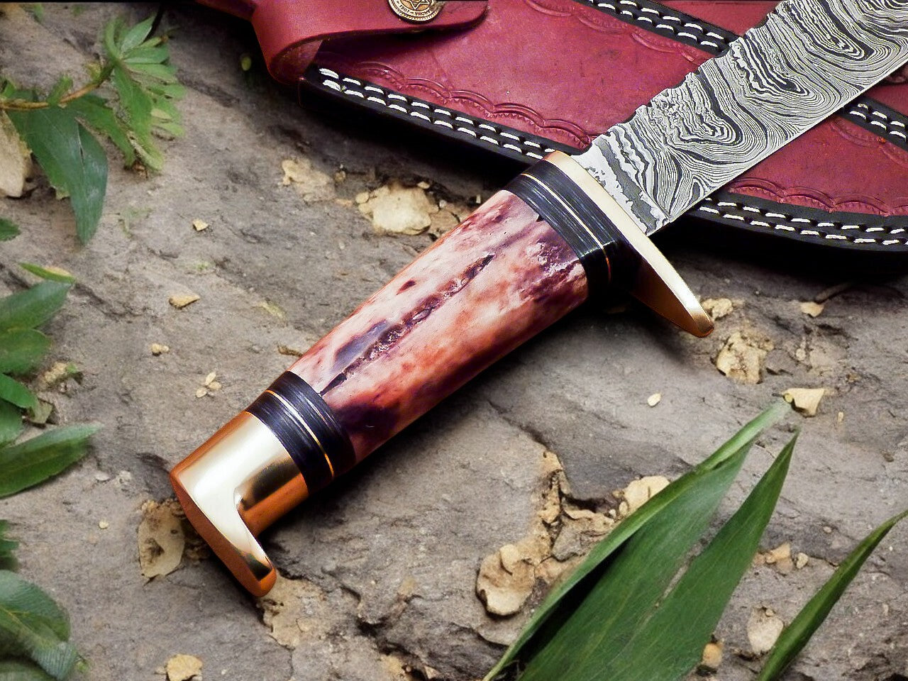 12-inch hunting knife alongside freshly caught game, demonstrating its functionality.