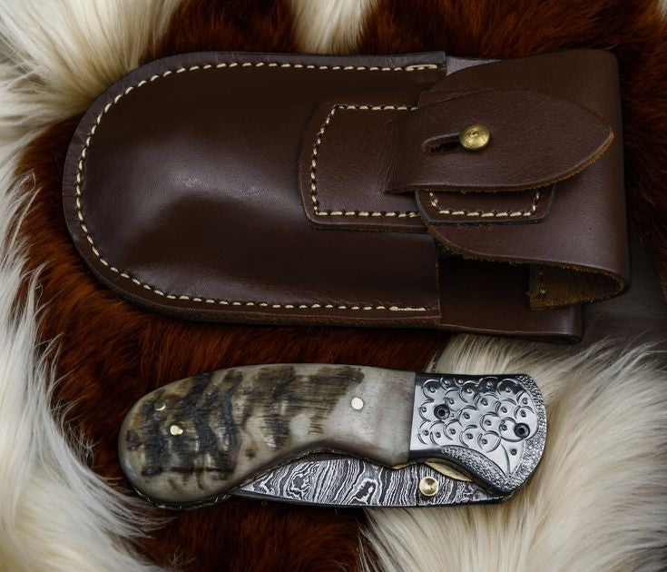 Foldable Knife with Sheep Horn Handle and Liner Lock Mechanism

