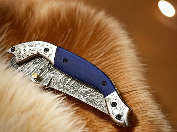 Close-up of Blue Wood Handle and Engraved Steel Bolster on Big Pocket Knife

