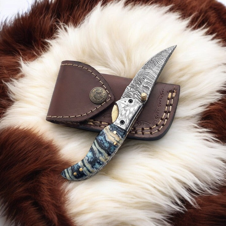 Close-up of Damascus Steel Blade on Pocket Knife Made in USA
