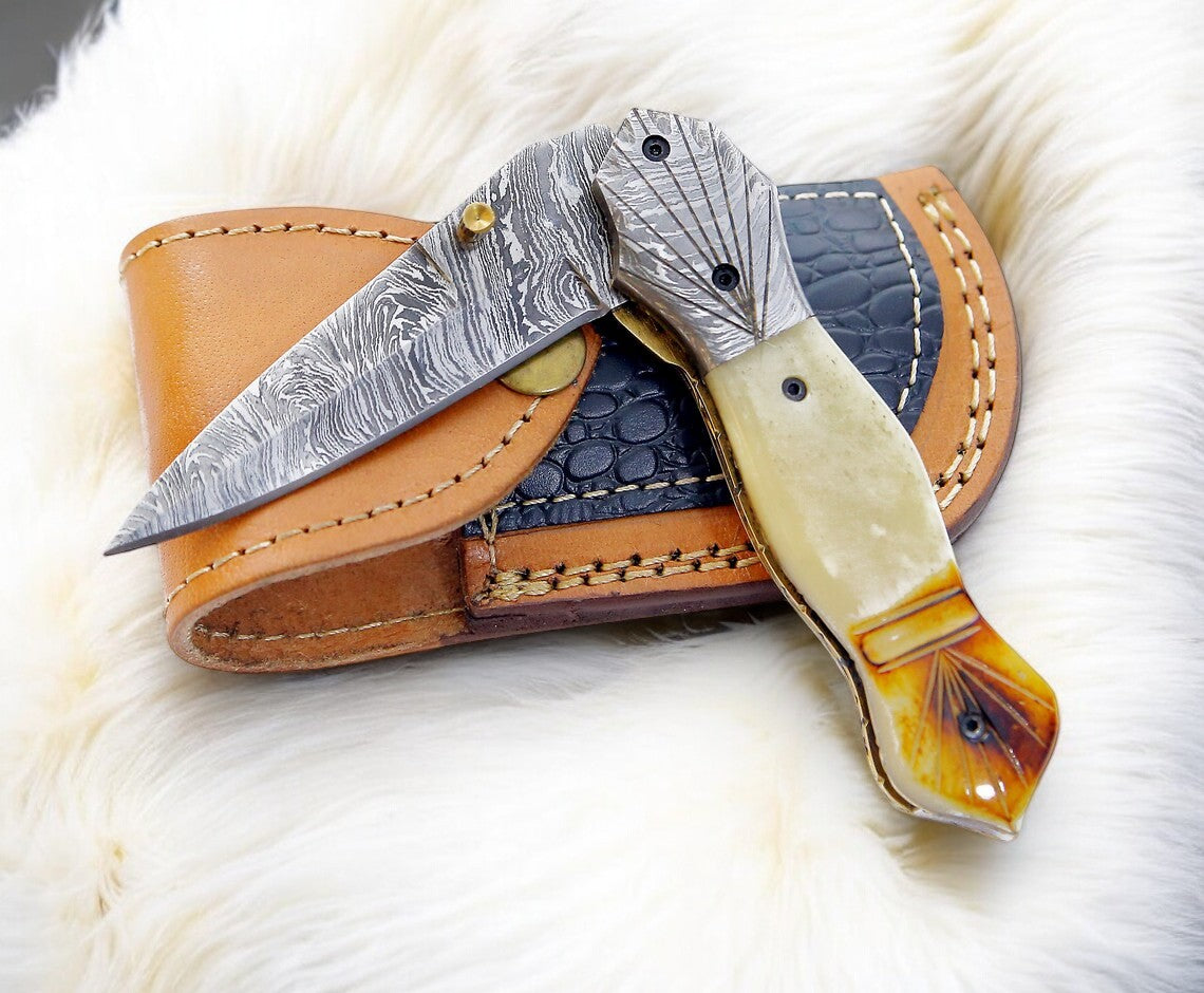 Close-up of Liner Lock Mechanism on Damascus Folding Dagger
