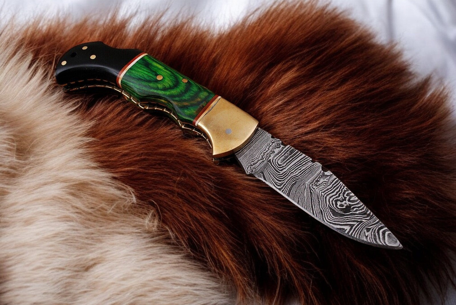 Custom handmade small folding knife with back lock mechanism
