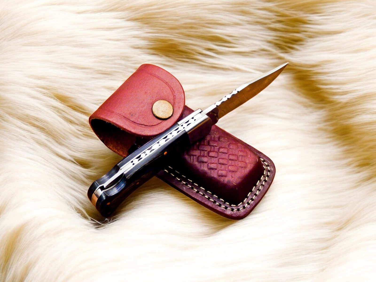 Close-up of Exotic Wood Handle on Handmade Folding Knife
