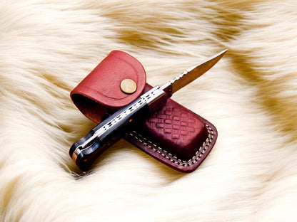 Close-up of Exotic Wood Handle on Handmade Folding Knife
