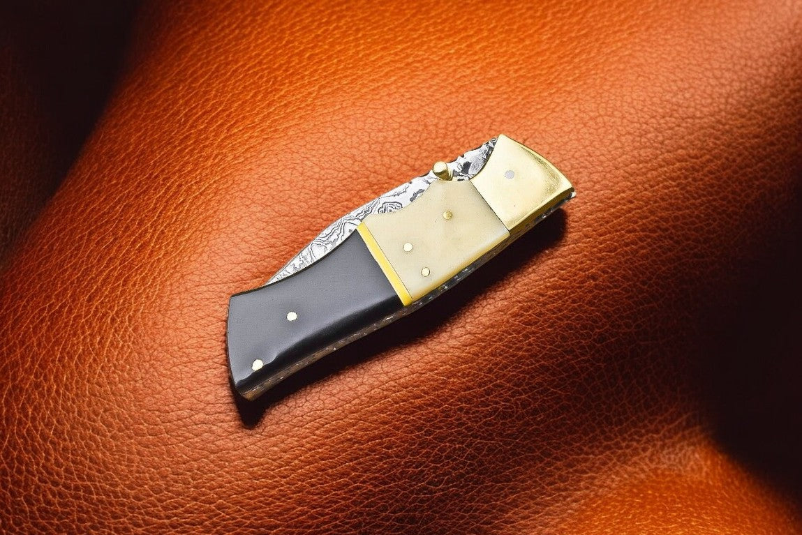 "Liner lock mechanism of the custom Damascus pocket knife"
