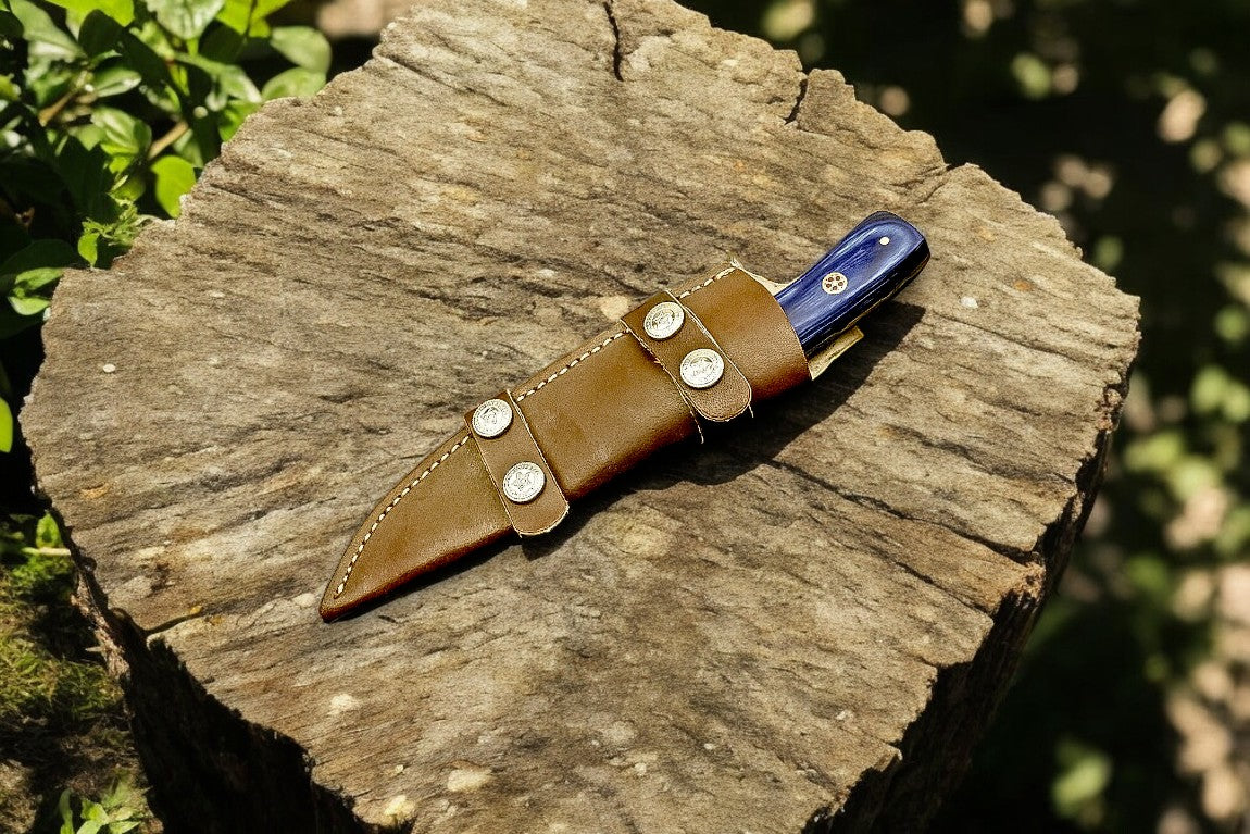 Full view of the handmade hunting knife with leather sheath.
