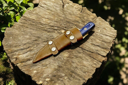 Full view of the handmade hunting knife with leather sheath.
