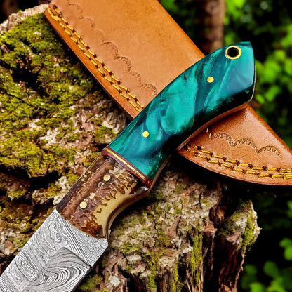 Handcrafted custom skinning knife with ergonomic handle
