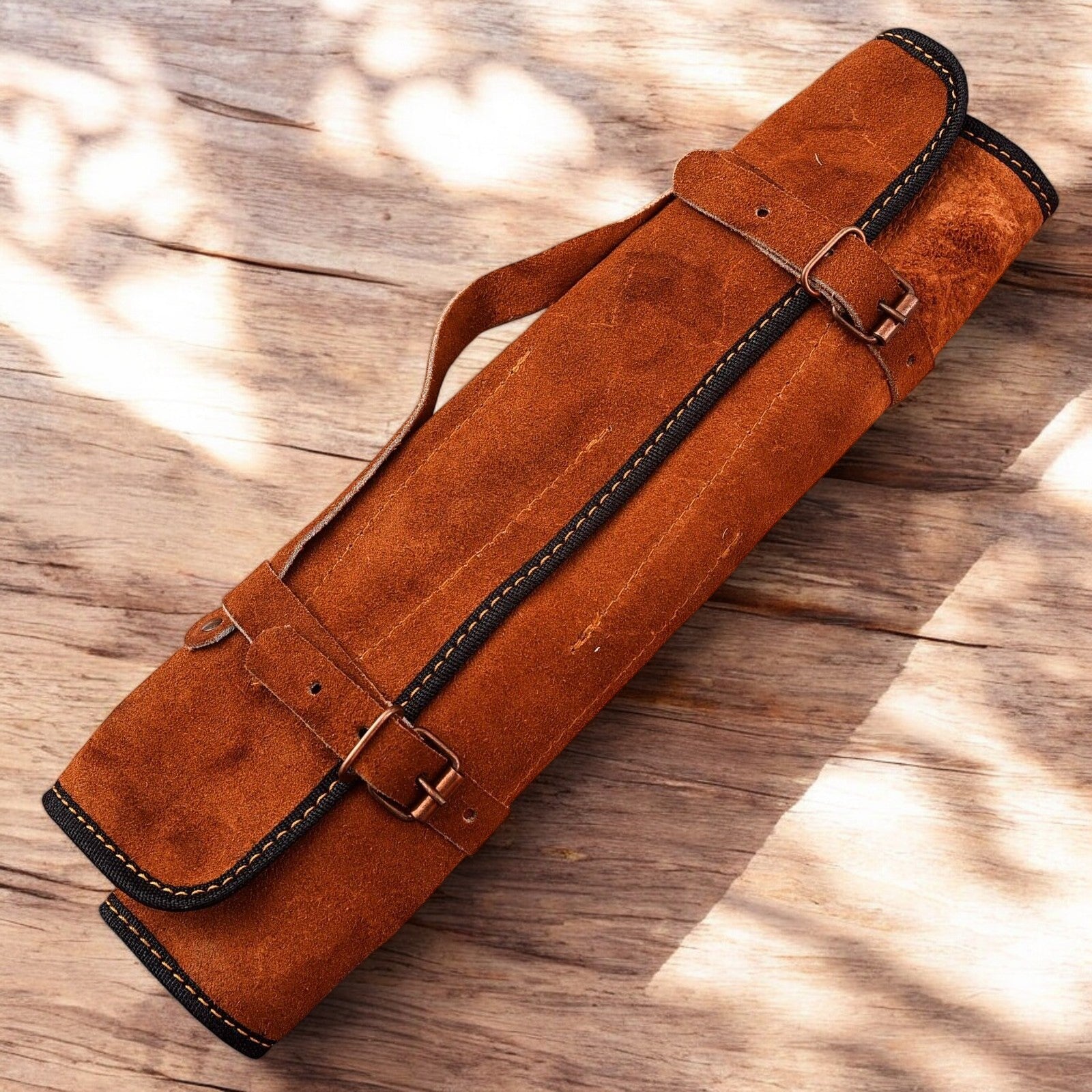 knives in a leather roll.
