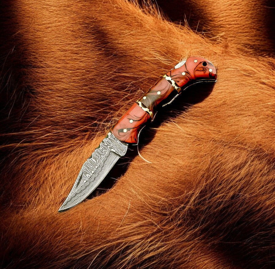 Damascus pocket knife 
