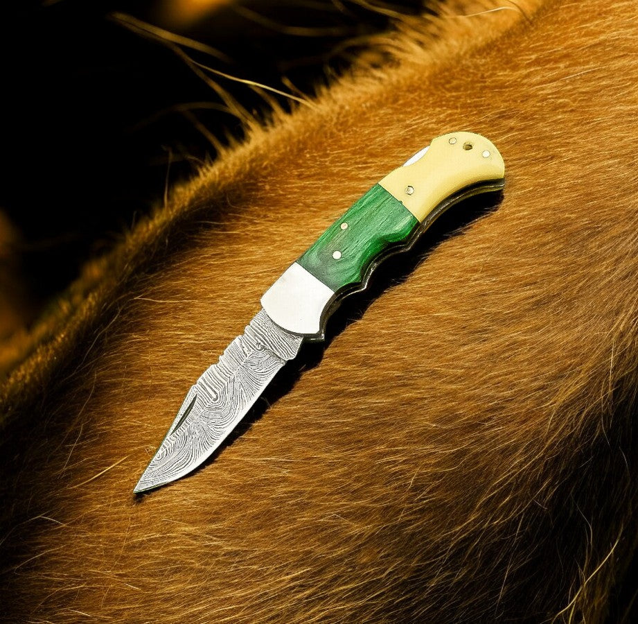 "Custom handmade 3 inches pocket knife with Damascus steel blade."
