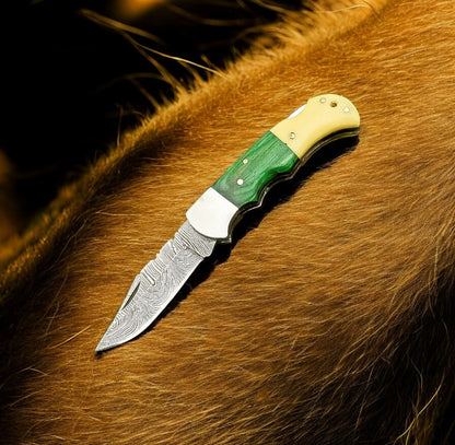"Custom handmade 3 inches pocket knife with Damascus steel blade."
