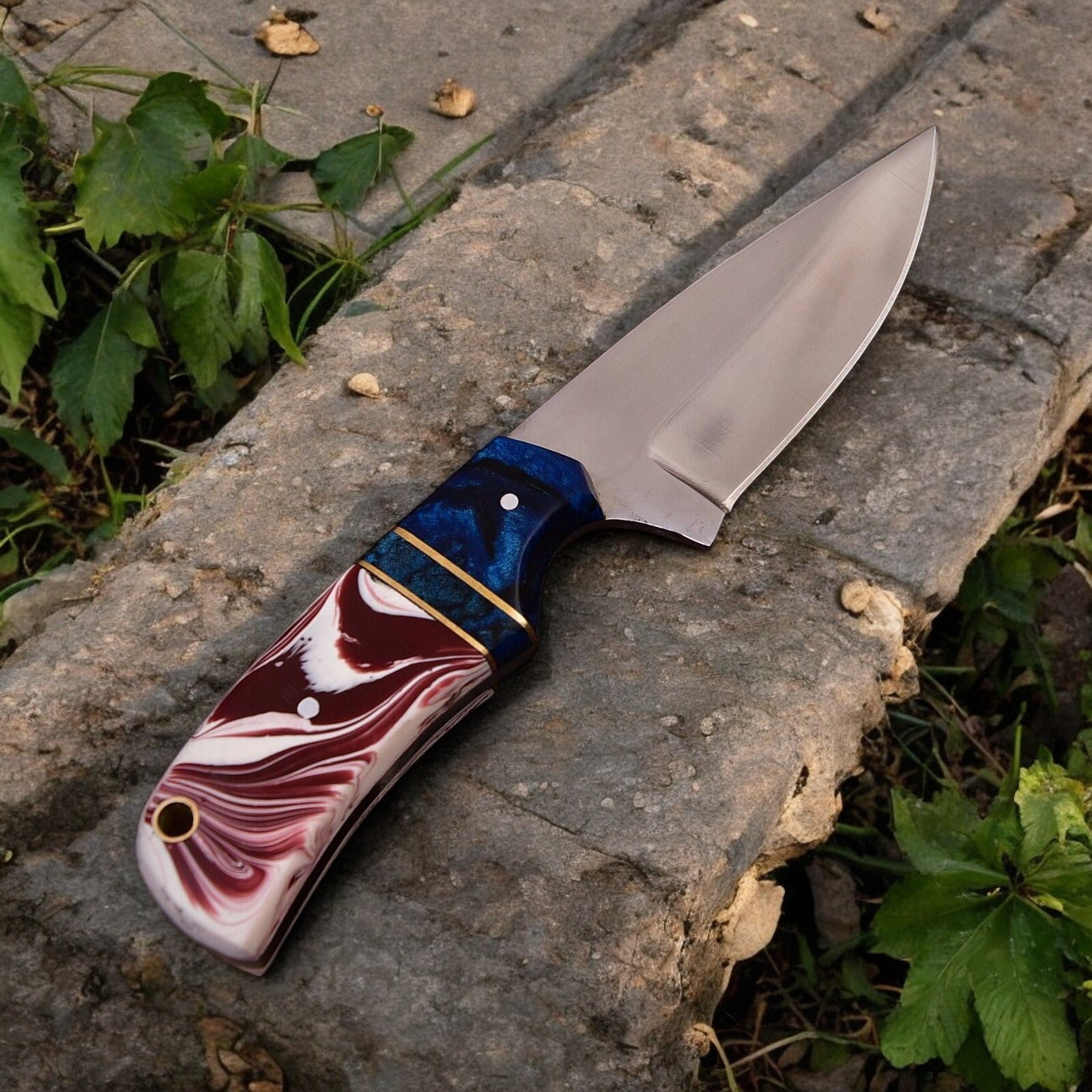 Full view of the 7.5-inch hunting knife with high carbon steel blade and epoxy resin handle.
