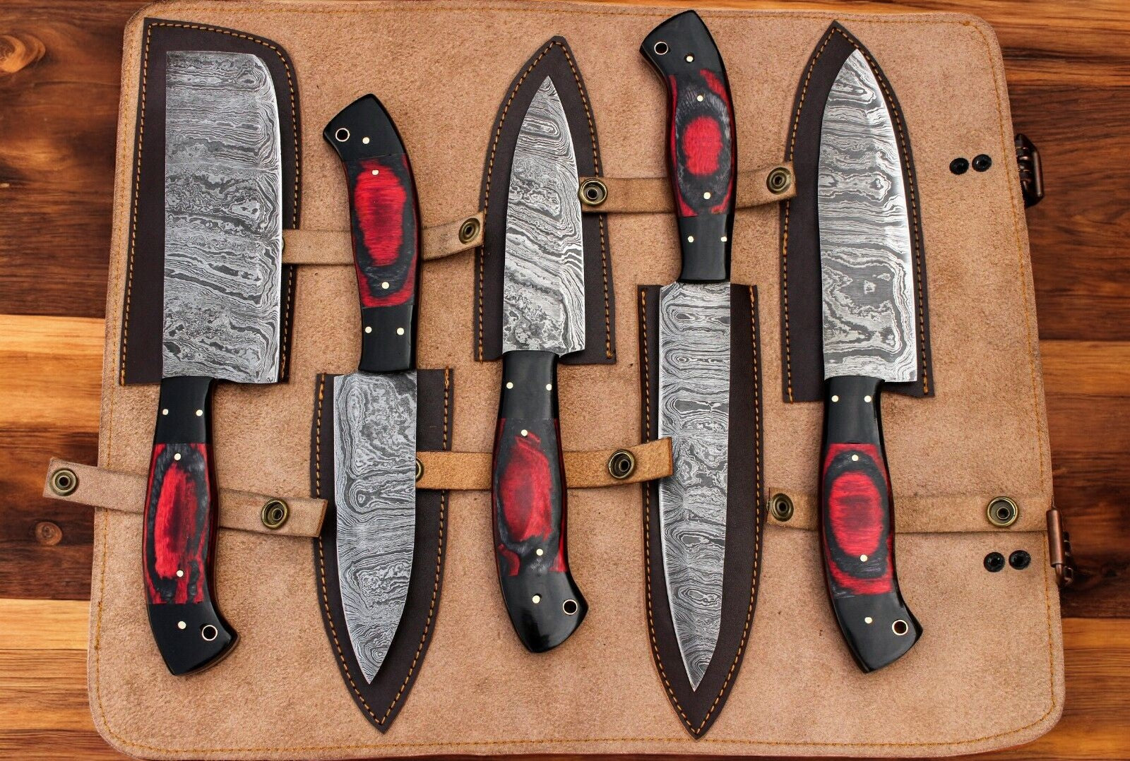  chef knives in a leather roll.
