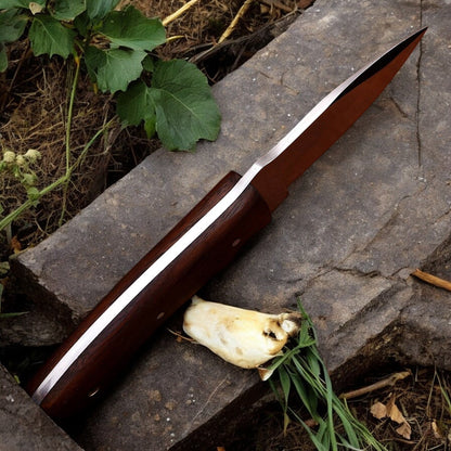 Full view of 8-inch handmade hunting knife with high carbon steel blade and rosewood handle.

