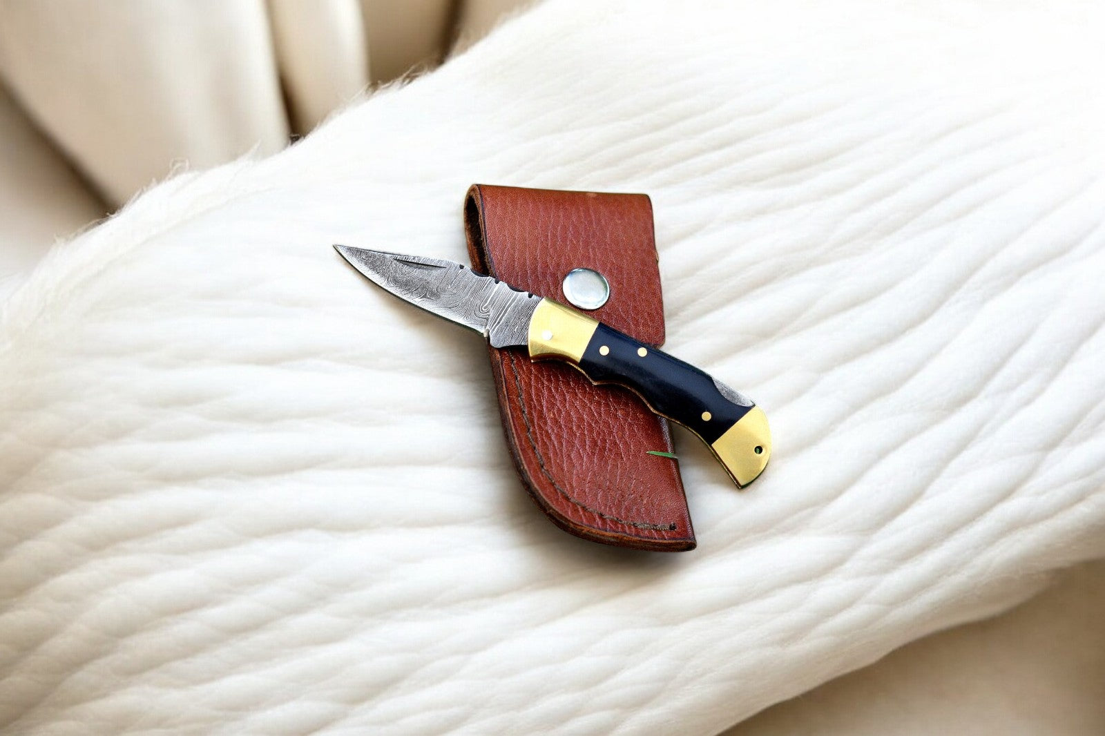 Black Folding Knife with Leather Sheath Included
