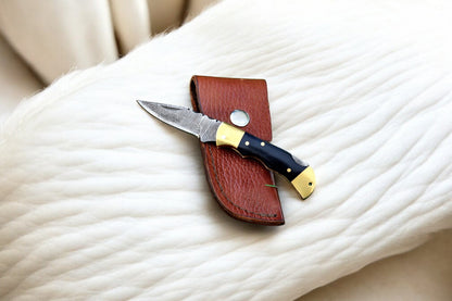 Black Folding Knife with Leather Sheath Included
